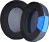 Two headphone ear pads are shown, with one cut away to reveal its internal layers. Podgląd zdjęcia produktu