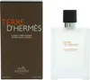 A product shot of a bottle of Hermes Terre D'Hermes after-shave lotion and its packaging. Produktbild-Vorschau