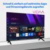 A modern TV displaying a smart TV interface with various app icons and streaming service logos. Produktbild-Vorschau