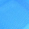 A close-up view of a blue pool cover with a bubble pattern. Produktbild-Vorschau