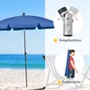 A split image showing a blue beach umbrella on a sandy beach with the ocean in the background on the left, and on the right, close-ups of the umbrella's adjustable mechanism and a person carrying the umbrella in a bag. Produktbild-Vorschau