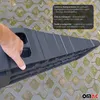 A hand holds a black plastic ramp. The ramp is on a gray and green interlocking paving surface. Náhled obrázku produktu