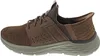 A side view of a single brown Skechers shoe. Produktbild-Vorschau