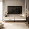 A modern living room with a TV stand, TV, and decorative elements. Náhled obrázku produktu