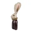A decorative figurine of a rabbit wearing a ruffled collar and a dark jacket. Produktbild-Vorschau