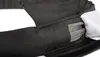 Close-up view of a black sling with visible stitching and internal gray cords. Produktbild-Vorschau
