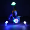 A glowing magnetic ball track set is displayed in a dark environment with spotlights. Anteprima dell’immagine prodotto