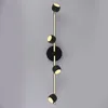 A modern wall lamp with multiple adjustable spotlights. Podgląd zdjęcia produktu