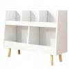 A white children's bookshelf with wooden legs, shown against a white background. Podgląd zdjęcia produktu