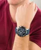 A close-up shot of a man's wrist wearing a blue and silver Festina chronograph watch. Náhled obrázku produktu