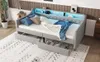 A modern grey daybed with blue ambient lighting and open storage drawers, set in a bedroom with a patterned rug. Náhled obrázku produktu