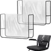 Two clear plastic chair covers with black frames are shown, with a black salon chair in the foreground. Produktbild-Vorschau