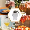 A collage of images showing a honey dispenser being used in various settings, including drizzling honey on toast, tea, and waffles, as well as a standalone product shot. Produktbild-Vorschau