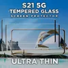 A marketing image for a phone screen protector, showing two screen protectors layered over a phone displaying a modern architectural scene. Produktbild-Vorschau