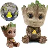 Two Baby Groot planters are shown against a white background. The larger planter is in the foreground, and a smaller planter is in the background to the left. Both planters are holding a small yellow chick in a nest. Produktbild-Vorschau