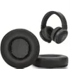 A pair of black replacement ear pads for headphones and a pair of black headphones are shown against a white background. Produktbild-Vorschau