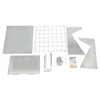 Various metal components and hardware for a hay feeder are laid out on a white background. Podgląd zdjęcia produktu