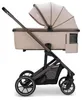 A side view of a beige and brown baby stroller. Produktbild-Vorschau