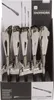 A display box filled with extendable metal shoehorns. Produktbild-Vorschau