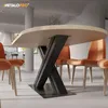 A modern dining room with an oval wooden table and black metal X-frame legs, surrounded by orange chairs. Podgląd zdjęcia produktu