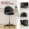 A black PU leather office chair with wheels is shown in a studio setting, with close-up shots highlighting its features. Náhled obrázku produktu