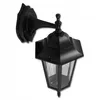 A black outdoor wall lamp with glass panels, shown against a white background. Produktbild-Vorschau
