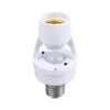 A white lamp socket adapter with a motion sensor. Podgląd zdjęcia produktu