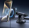 A smartphone is magnetically attached to a car dashboard mount which is also a wireless charger. Anteprima dell’immagine prodotto