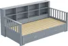 A gray daybed with a bookshelf headboard and drawers underneath, shown from a diagonal angle. Náhled obrázku produktu