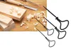 A set of hand drills and wood shavings on a wooden surface. Produktbild-Vorschau