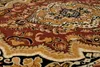 A close-up view of a patterned rug. Voir les images du produit