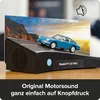 A model car on a display stand with a scenic backdrop and sound module. Náhľad obrázku produktu