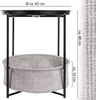 A side view of a round side table with a fabric basket underneath, showing dimensions. Produktbild-Vorschau