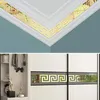 The image shows decorative mirror stickers with a geometric Greek key pattern applied to a ceiling corner and a wardrobe. Náhľad obrázku produktu