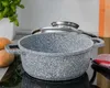 A speckled gray pot with a silver lid sits on a black stovetop. Potatoes and a plant are visible in the background. Náhľad obrázku produktu
