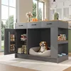 A dog is resting in a dog bed integrated into a kitchen island. Anteprima dell’immagine prodotto