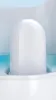 A close-up view of a white water filter with the brand name embossed on it, submerged in blue water within a humidifier. Produktbild-Vorschau