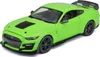 A bright green toy model of a Ford Mustang Shelby GT500 car is shown from a slightly elevated side-angle against a white background. Podgląd zdjęcia produktu