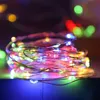 A close-up shot of a coiled string of multi-colored LED lights. Podgląd zdjęcia produktu
