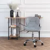 A gray upholstered office chair is placed next to a wooden desk with shelves. Podgląd zdjęcia produktu