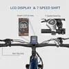 Close-up view of an e-bike's handlebars, focusing on the LCD display and gear shifter, with text overlays highlighting features. Produktbild-Vorschau