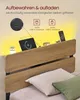 A bed frame with a headboard featuring integrated LED lighting and charging ports. Produktbild-Vorschau