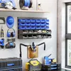 A well-organized workshop wall with various tools and storage solutions. Anteprima dell’immagine prodotto