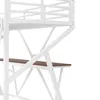 A close-up view of a white metal loft bed frame with a wooden desk surface. Voir les images du produit