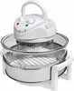 A white halogen oven with a glass bowl and metal racks is shown against a white background. Voir les images du produit