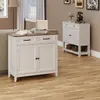 Two white cabinets are shown in a room with wood flooring. Náhľad obrázku produktu