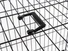 Close-up of a black plastic handle attached to a black wire cage. Voir les images du produit