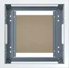 A white framed metal enclosure with a brown panel inside, viewed from the front. Anteprima dell’immagine prodotto
