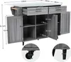 A grey kitchen island with drawers and cabinets, shown with dimensions and close-ups of the wheels and legs. Náhled obrázku produktu