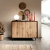 A modern kommode with a slatted wood front is displayed in a well-lit room, styled with decorative items and a plant. Produktbild-Vorschau